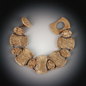 Vickie Hallmark | Flock bird bracelet, bronze metal clay, textures from original drawings