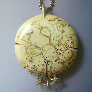 Vickie Hallmark | Fly bird pendant back, riveted fine silver metal clay and carved faux bone with paper in resin