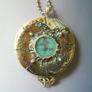 Vickie Hallmark | Fly bird pendant, riveted fine silver metal clay and carved faux bone with paper in resin