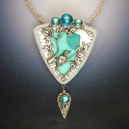 Vickie Hallmark | Moonbird bird necklace, riveted fine silver metal clay sandwich with carved faux bone insert